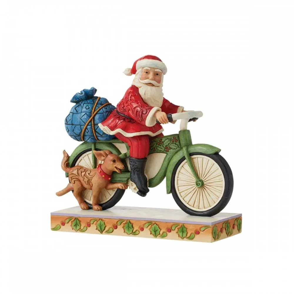 Jim Shore Heartwood Creek Statuina di Babbo Natale Bicicletta
