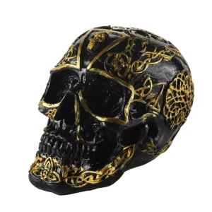Statua di teschio messicano nero e oro 12 cm