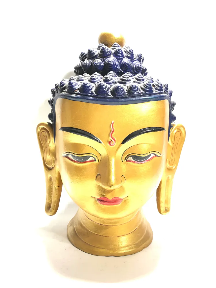 Statua volto di Buddha dorato