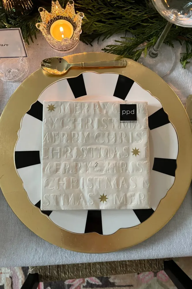 Tovaglioli di Buon Natale e grandi stelle dorate